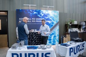 Purus sin stand på Fish Farmer 2026 med budskapet Kontroll på vannet, kontroll på produksjonen